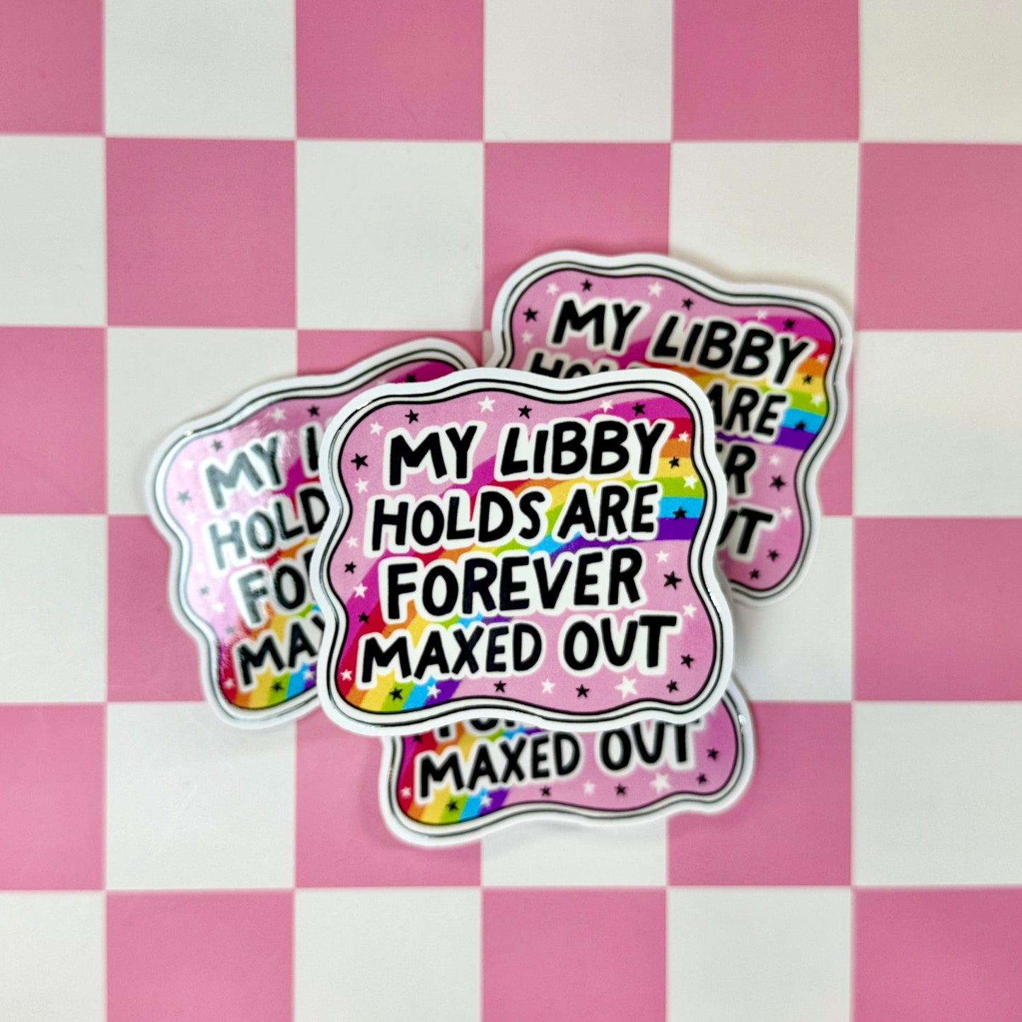 Libby Holds Maxed Out Sticker